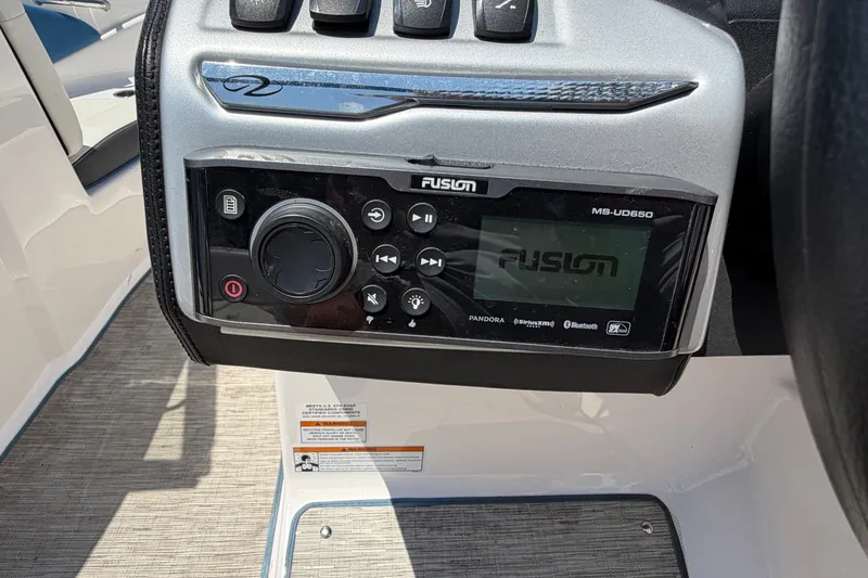 Slide: The Image of Fusion stereo system on 2016 Regal 1900 ESX Bowrider boat dashboard. - 22