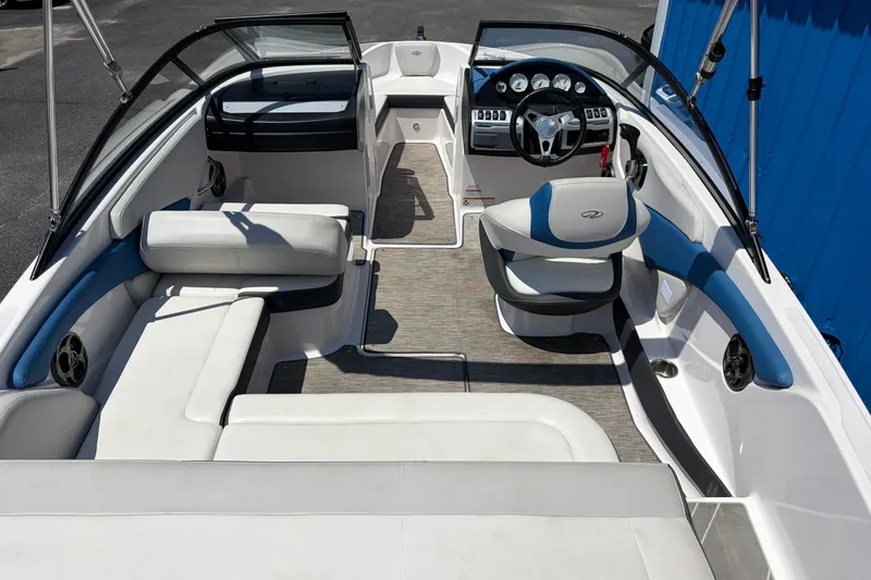 Slide: The Image of 2016 Regal 1900 ESX Bowrider interior with modern seating and steering wheel. - 20