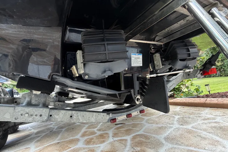 Slide: The Image of 2022 Yamaha Boats AR210 jet propulsion system and trailer detail. - 42