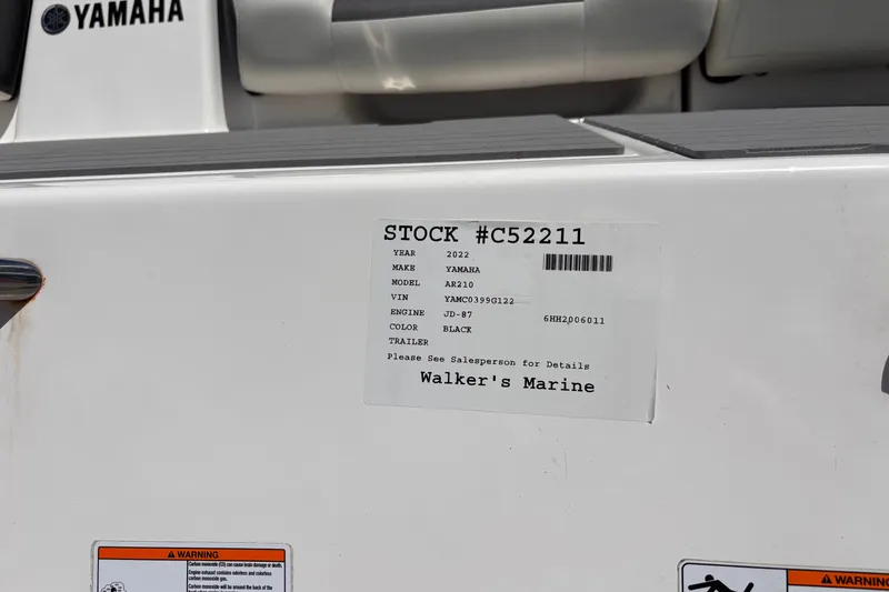 Slide: The Image of 2022 Yamaha AR210 boat label with stock number C52211 at Walker's Marine. - 45
