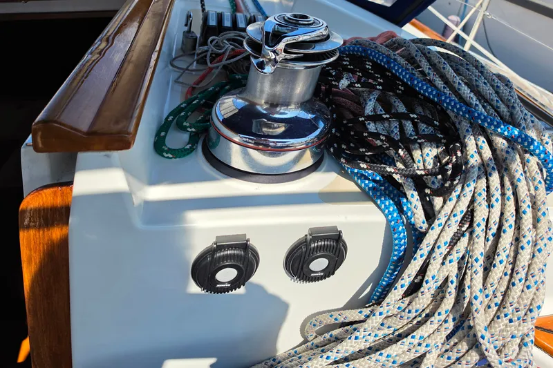 Slide: The Image of Sailing ropes and winch on a 2008 Tartan 4300 yacht deck. - 12
