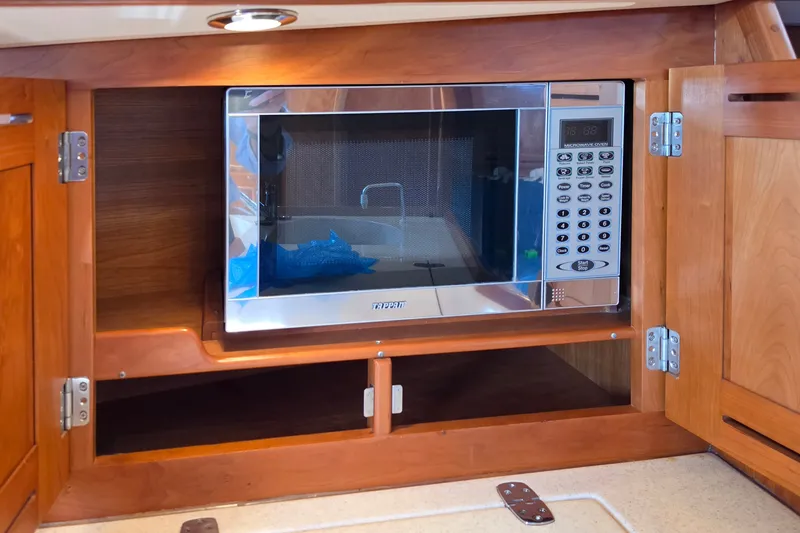 Slide: The Image of Built-in microwave in wooden cabinet on Tartan 4300, 2008 model yacht. - 29