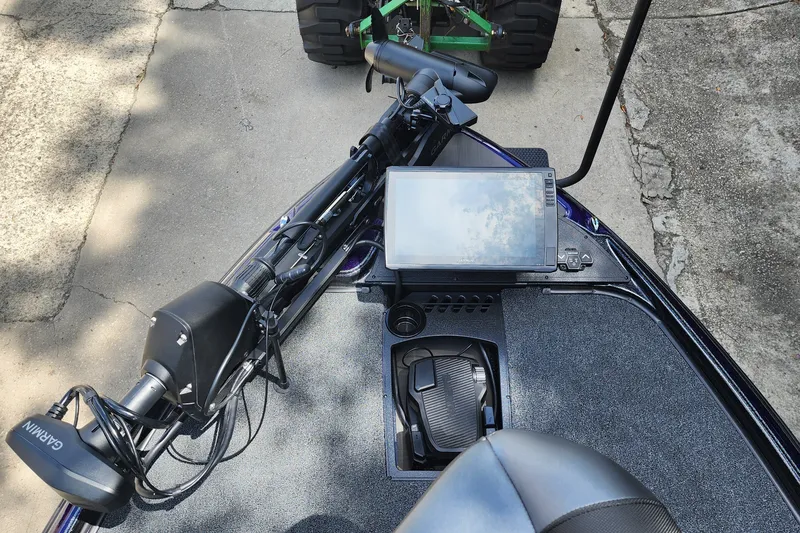 Slide: The Image of 2027 Nitro Z21 XL Pro boat with Garmin electronics and foot pedal on deck. - 7