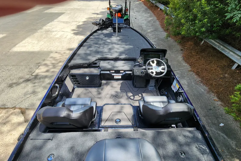 Slide: The Image of 2027 Nitro Z21 XL Pro boat interior with dual seats and modern steering console. - 3