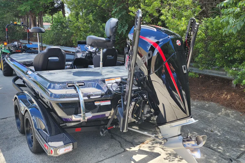 Slide: The Image of 2027 Nitro Z21 XL Pro boat with powerful outboard motor, parked on a trailer. - 4