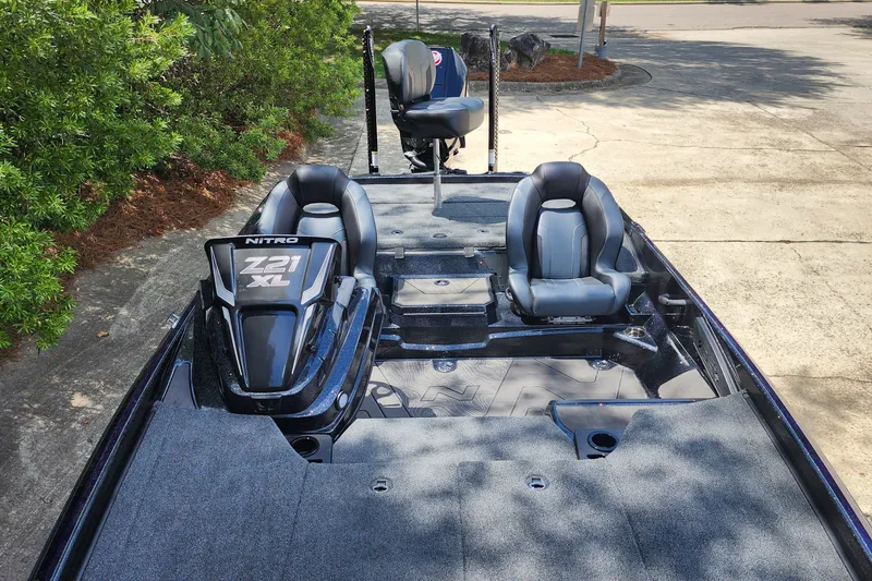 Slide: The Image of 2027 Nitro Z21 XL Pro boat interior with sleek seating and modern design. - 9