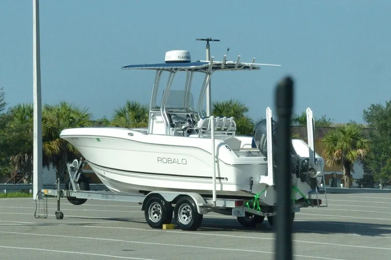 Slide: The Image of 2016 Robalo R200 Center Console boat on trailer in parking lot. - 30