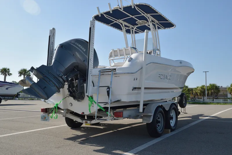 Slide: The Image of 2016 Robalo R200 Center Console boat on trailer with Yamaha outboard motor. - 2