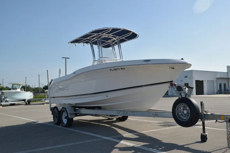 Slide: The Image of 2016 Robalo R200 Center Console boat on trailer in parking lot. - 3