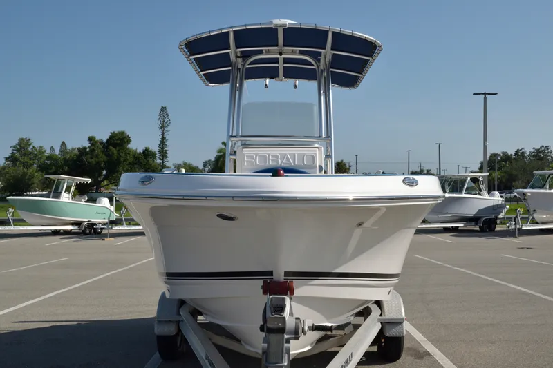 Slide: The Image of 2016 Robalo R200 Center Console boat on trailer in parking lot. - 4
