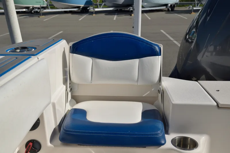 Slide: The Image of 2016 Robalo R200 Center Console boat seat with blue and white upholstery. - 13
