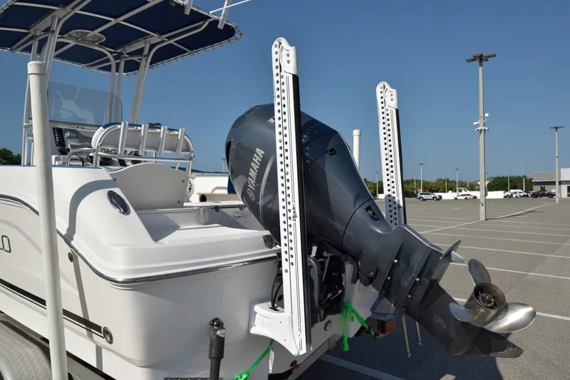 Slide: The Image of 2016 Robalo R200 Center Console boat with Yamaha outboard motor in parking lot. - 6