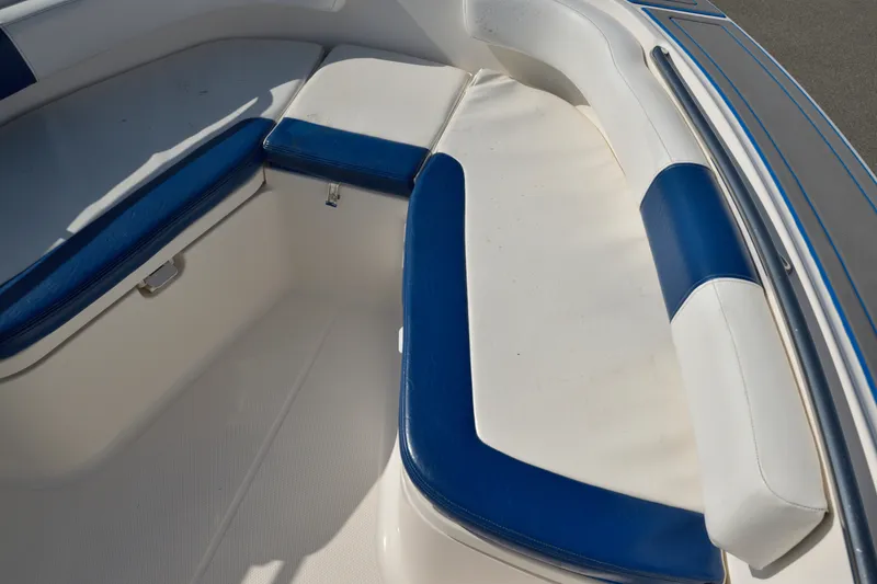 Slide: The Image of 2016 Robalo R200 Center Console boat interior with blue and white seating. - 29