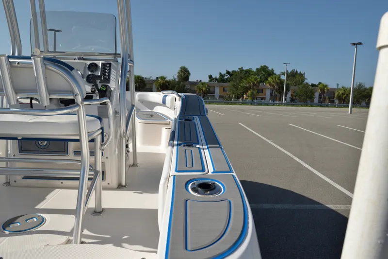 Slide: The Image of 2016 Robalo R200 Center Console boat interior in a parking lot. - 8