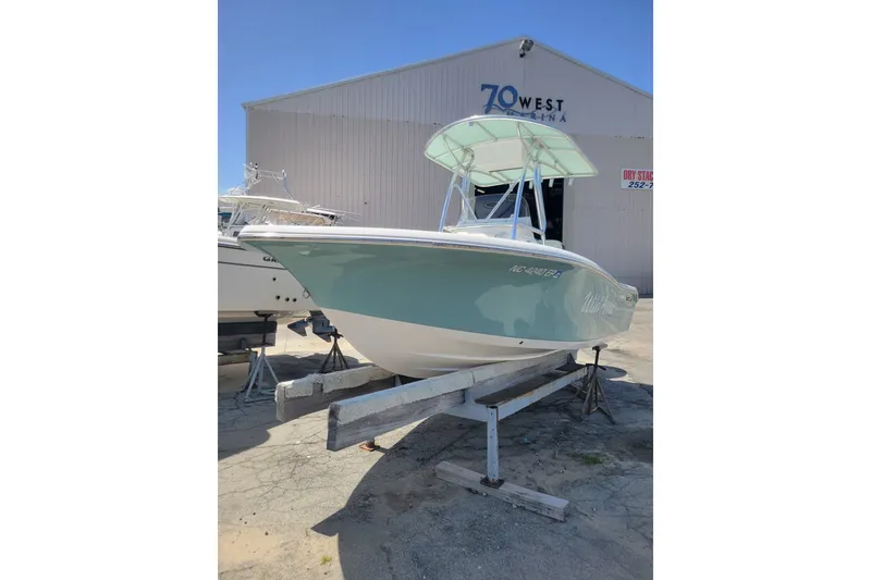 The Image of 2020 Tidewater 198 CC Adventure boat at 70 West Marina, displayed on a trailer. - 0