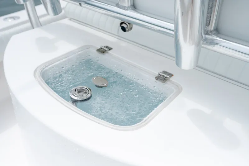 Slide: The Image of Livewell on 2008 Regulator 29 Forward Seating boat, filled with water. - 19