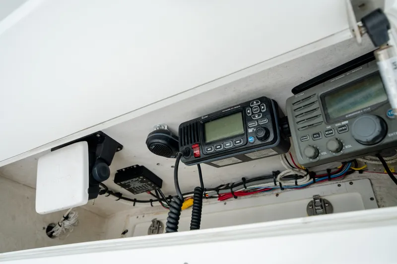 Slide: The Image of 2008 Regulator 29 Forward Seating boat electronics, featuring communication and navigation equipment. - 24