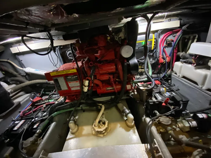 Slide: The Image of Engine room of 2001 Sea Ray 380 Aft Cabin with visible wiring and components. - 41