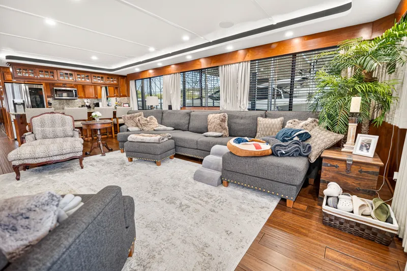 Slide: The Image of Luxurious 1999 Stardust Cruisers houseboat interior with elegant furnishings and modern kitchen. - 11