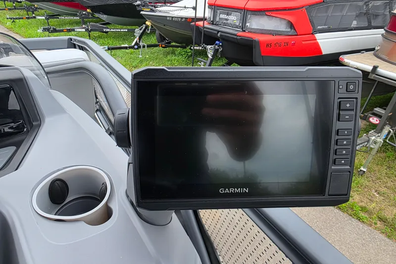 Slide: The Image of Garmin display on 2023 Sea-Doo Switch Sport 21 dashboard with cup holder. - 16