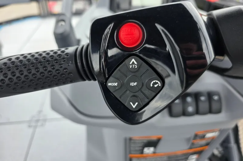 Slide: The Image of Close-up of 2023 Sea-Doo Switch Sport 21 handlebar controls with start/stop button. - 13