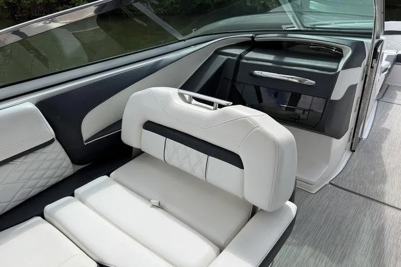 Slide: The Image of Luxurious interior of 2019 Regal 3300 Bowrider with elegant seating and modern design. - 19