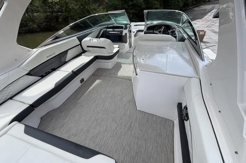 Slide: The Image of 2019 Regal 3300 Bowrider interior with spacious seating and modern design. - 22