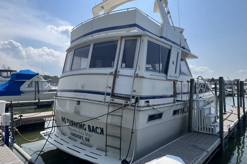 Slide: The Image of 1986 Chris Craft 47 Constellation yacht docked in Sandusky, Ohio marina. - 2