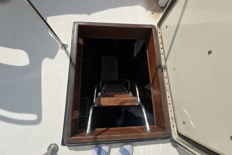Slide: The Image of Hatch entrance with ladder on 1986 Chris Craft 47 Constellation yacht. - 95