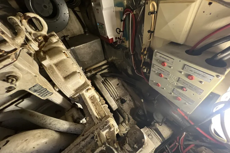 Slide: The Image of Engine room of 1986 Chris Craft 47 Constellation with control panels and wiring. - 102