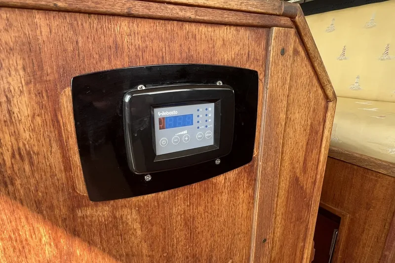 Slide: The Image of Webasto control panel on 1986 Chris Craft 47 Constellation wooden interior. - 29