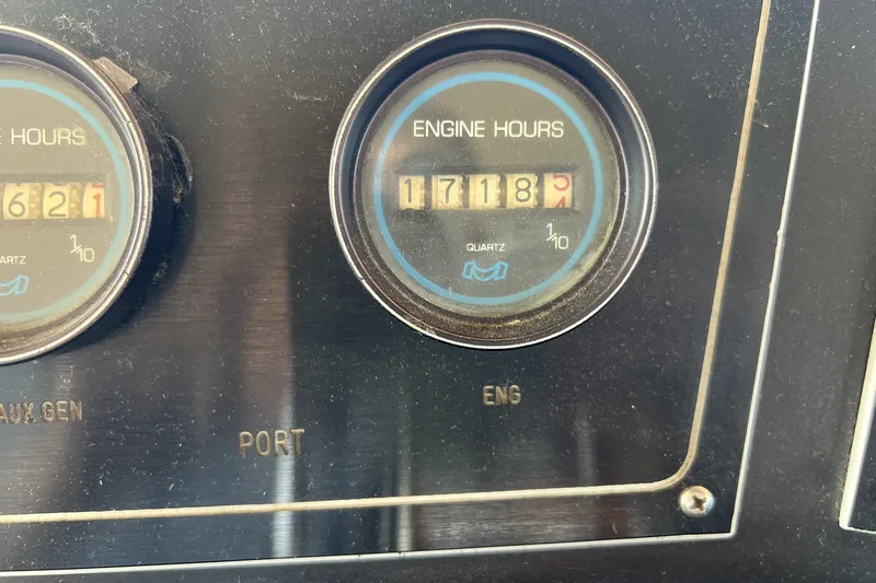Slide: The Image of Engine hour meters on 1986 Chris Craft 47 Constellation, showing 1718 and 1621 hours. - 108