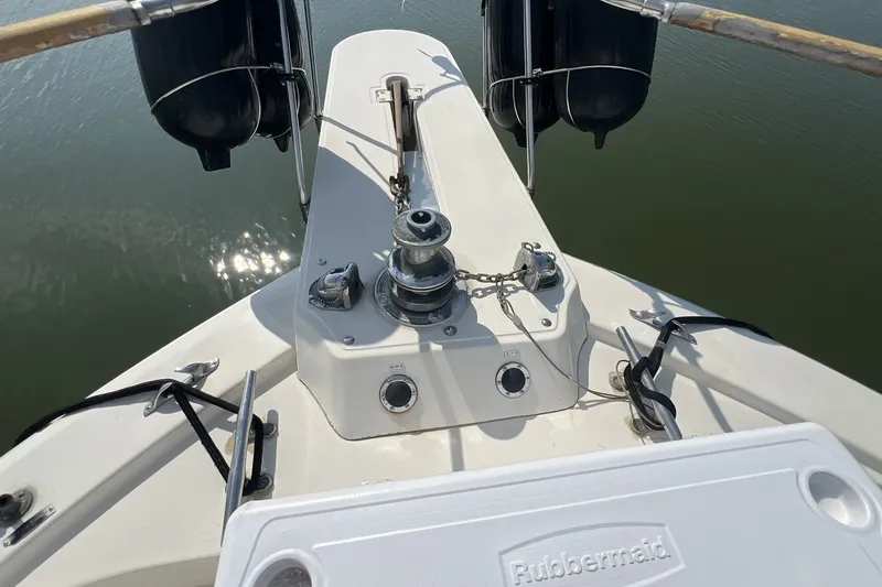 Slide: The Image of Bow of 1986 Chris Craft 47 Constellation yacht with anchor winch and fenders. - 116