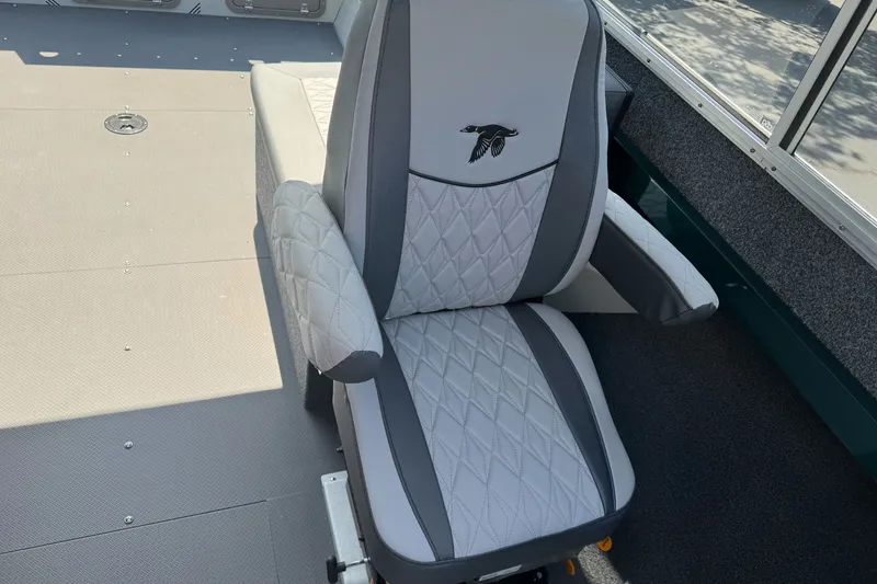 Slide: The Image of 2027 Duckworth 20 Discovery boat seat with quilted design and embroidered logo. - 18
