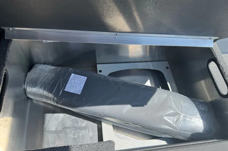 Slide: The Image of Storage compartment of 2027 Duckworth 20 Discovery boat with packaged item inside. - 25