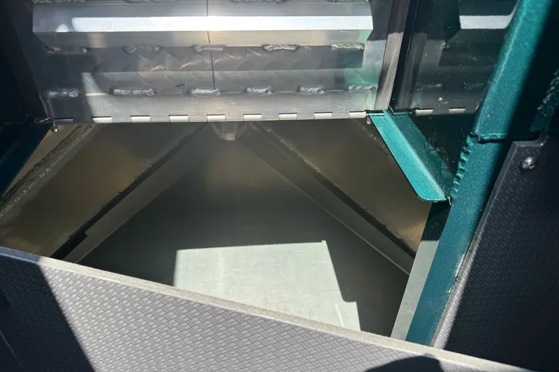 Slide: The Image of Interior view of a 2027 Duckworth 20 Discovery boat compartment. - 16