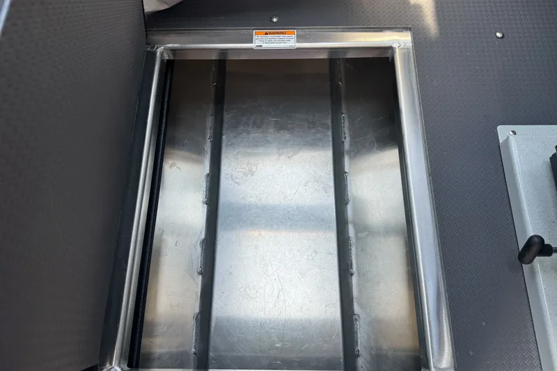 Slide: The Image of Storage compartment in 2027 Duckworth 20 Discovery boat interior. - 28