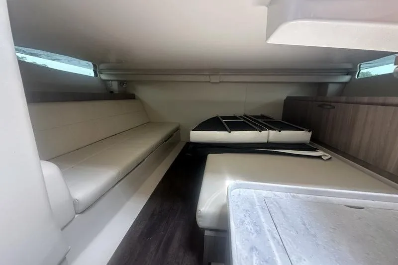Slide: The Image of 2021 Regal 38 SAV cabin interior with seating and storage. - 17