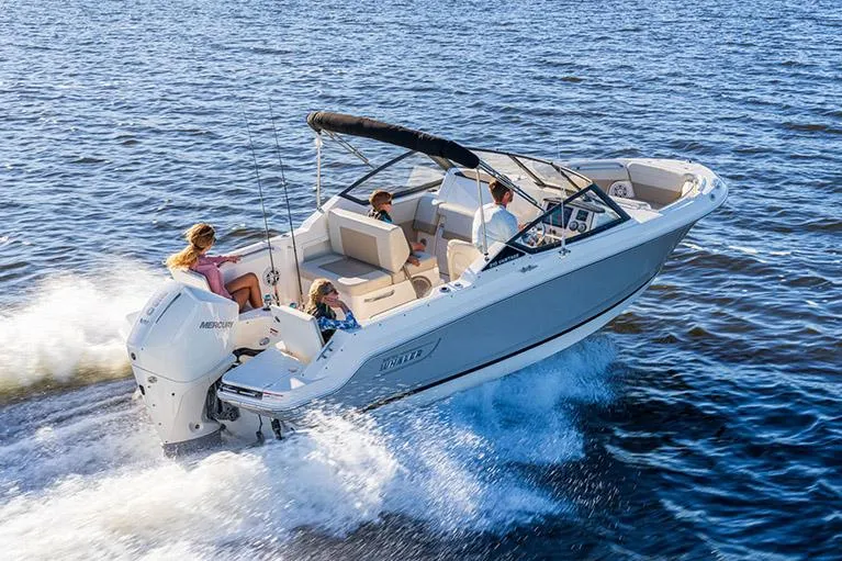 Slide: The Image of Manufacturer Provided Image: 2026 Boston Whaler 210 Vantage boat cruising on open water with passengers. - 6