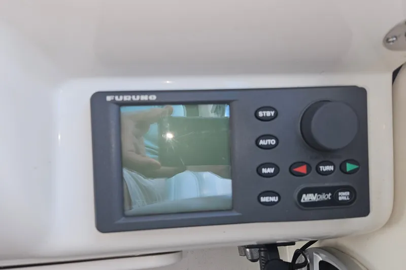 Slide: The Image of Furuno NavPilot control panel on 1996 Sea Ray 370 Express Cruiser. - 29