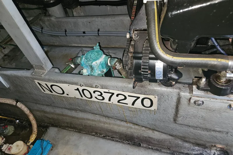 Slide: The Image of Engine compartment of 1996 Sea Ray 370 Express Cruiser with visible serial number 1037270. - 39