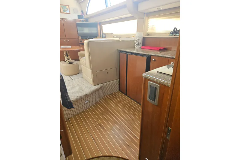 Slide: The Image of Interior of 2005 Meridian 368 Motoryacht with wood flooring and modern furnishings. - 24