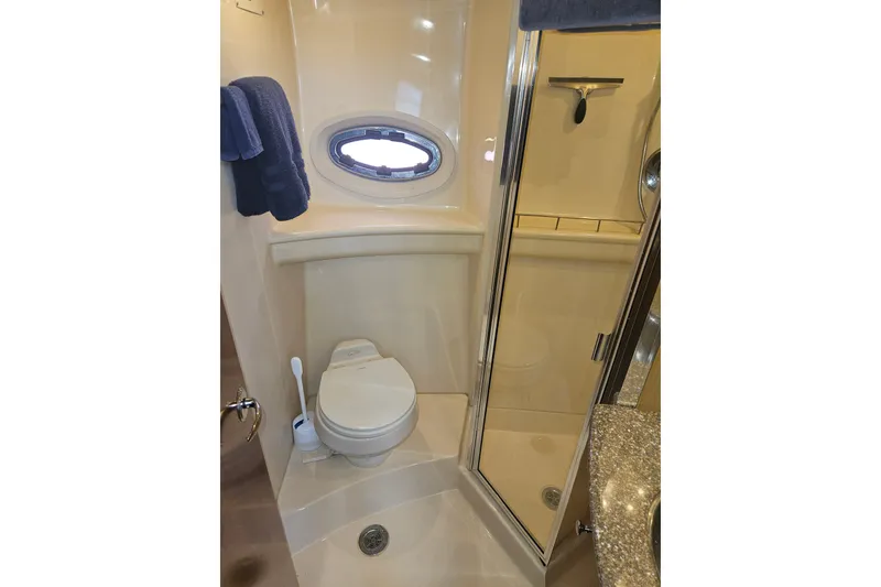 Slide: The Image of Bathroom of 2005 Meridian 368 Motoryacht with shower, toilet, and porthole window. - 34
