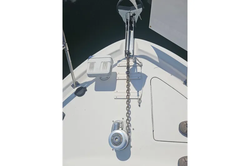 Slide: The Image of Bow of 2005 Meridian 368 Motoryacht with anchor chain and winch. - 58