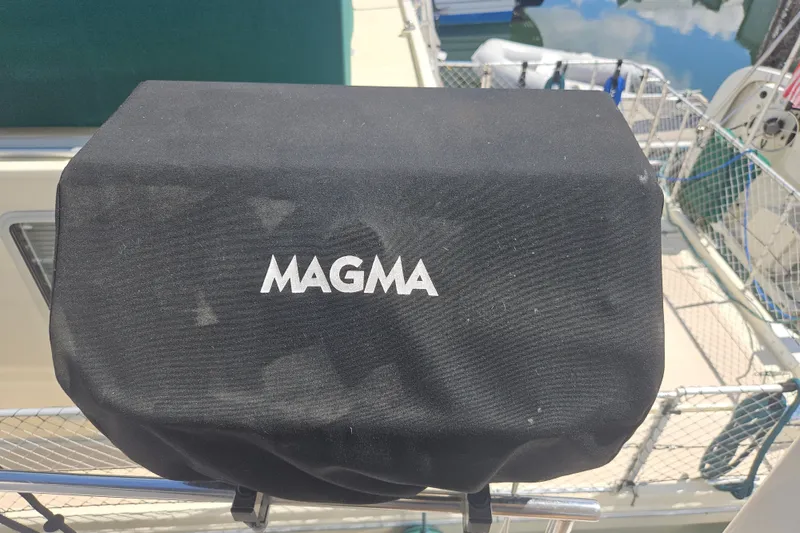 Slide: The Image of Black Magma grill cover on 2005 Meridian 368 Motoryacht deck. - 64