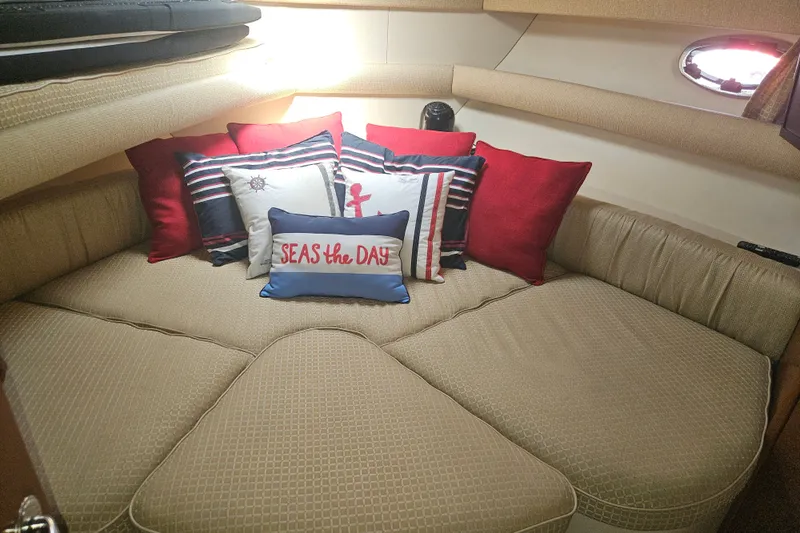 Slide: The Image of Cozy interior of 2005 Meridian 368 Motoryacht with nautical-themed pillows. - 37