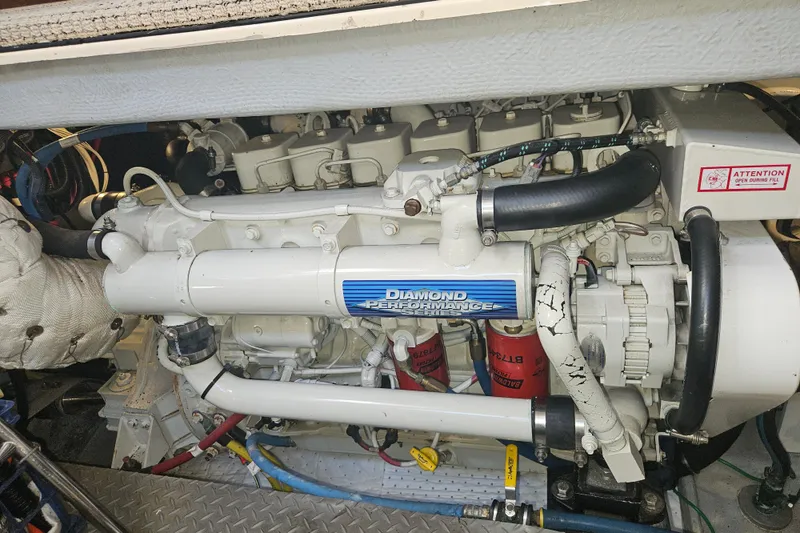 Slide: The Image of Engine compartment of a 2005 Meridian 368 Motoryacht with Diamond Performance Series engine. - 66