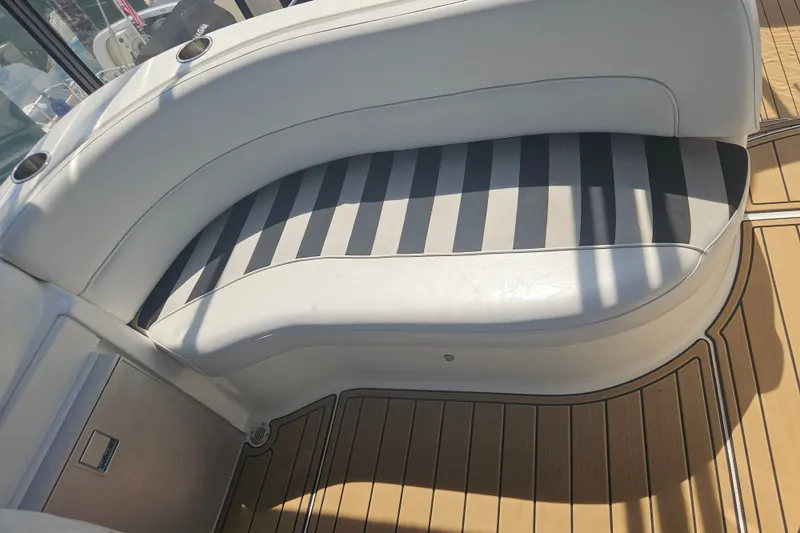 Slide: The Image of Luxury seating on 2005 Meridian 368 Motoryacht with striped cushions and teak flooring. - 14