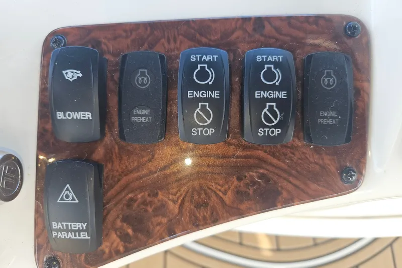 Slide: The Image of Control panel of a 2005 Meridian 368 Motoryacht with engine and blower switches. - 51