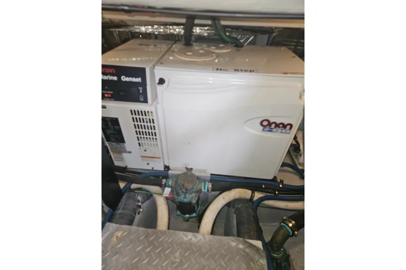 Slide: The Image of Onan marine generator in 2005 Meridian 368 Motoryacht engine room. - 68